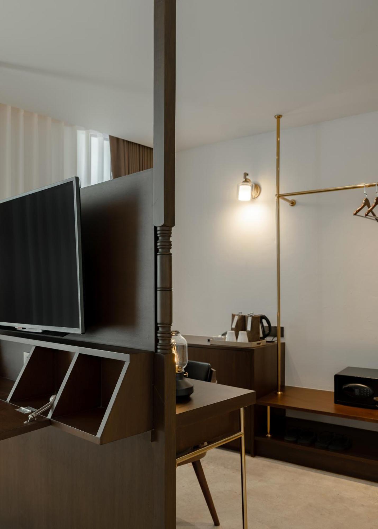 Nidhra Boutique Hotel Bangkok Sukhumvit Rum bild