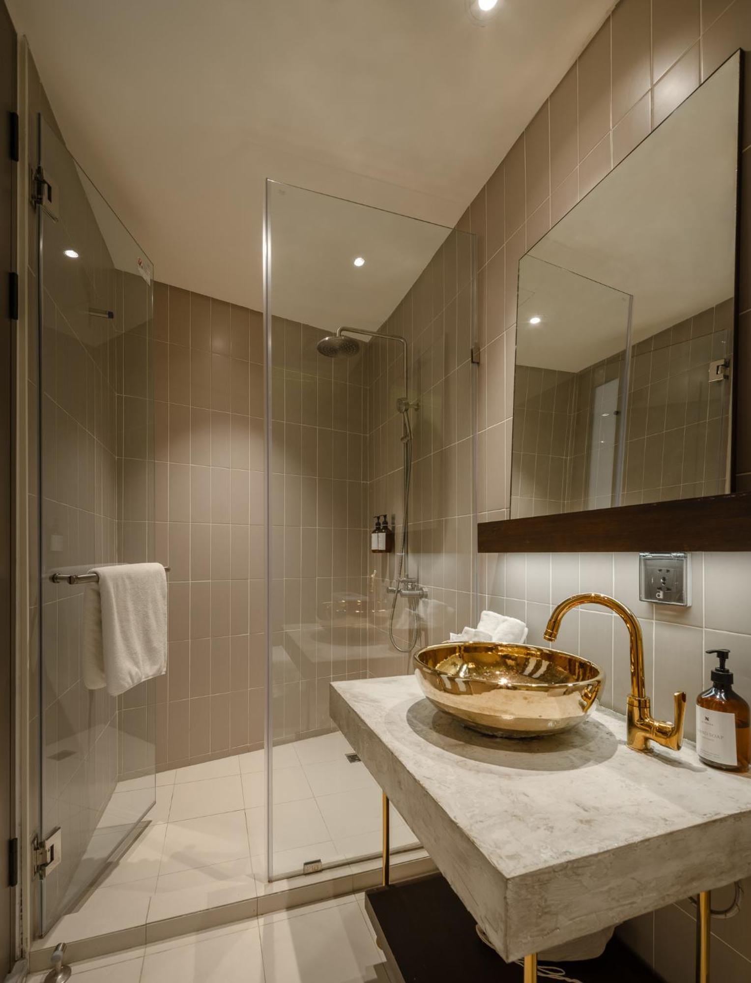 Nidhra Boutique Hotel Bangkok Sukhumvit Rum bild